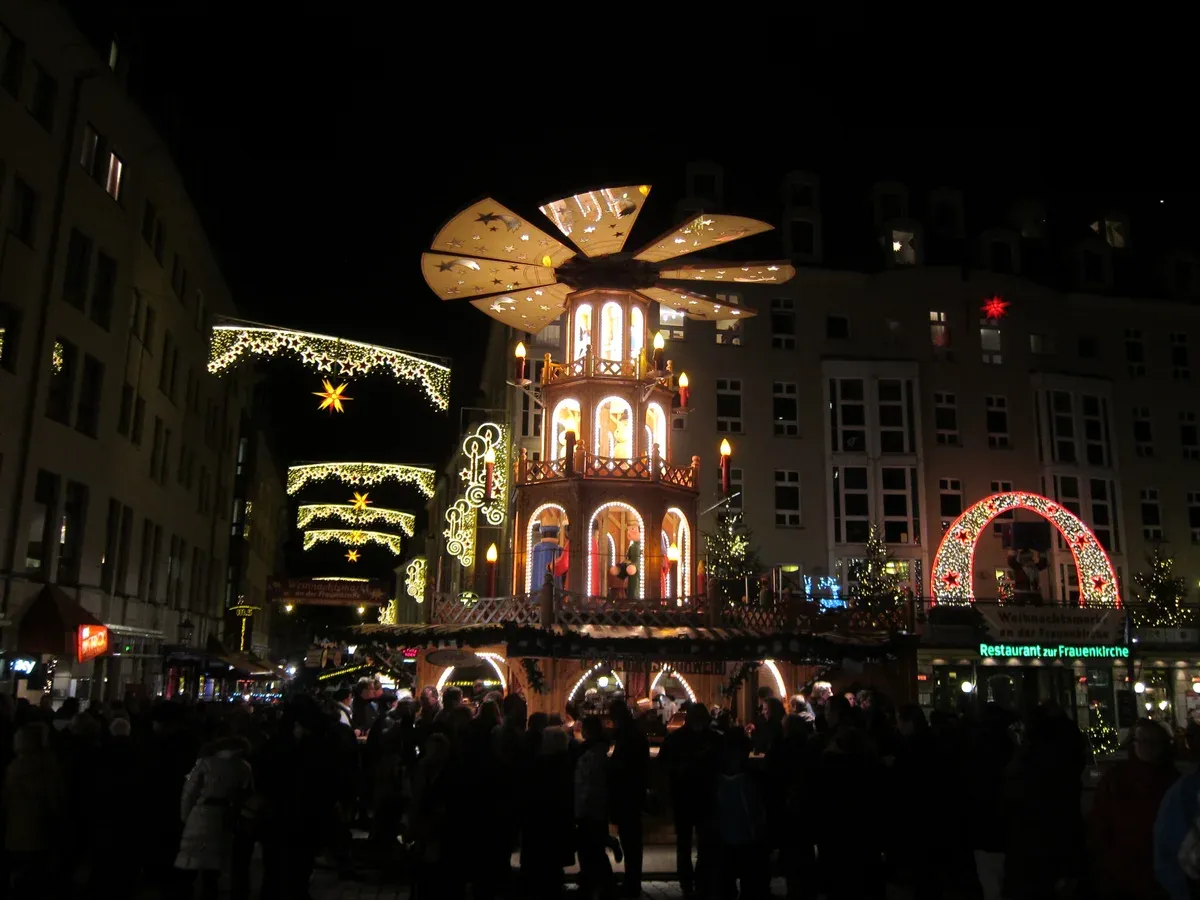 Lit Christmas pyramid at a Dresden Christmas market at night