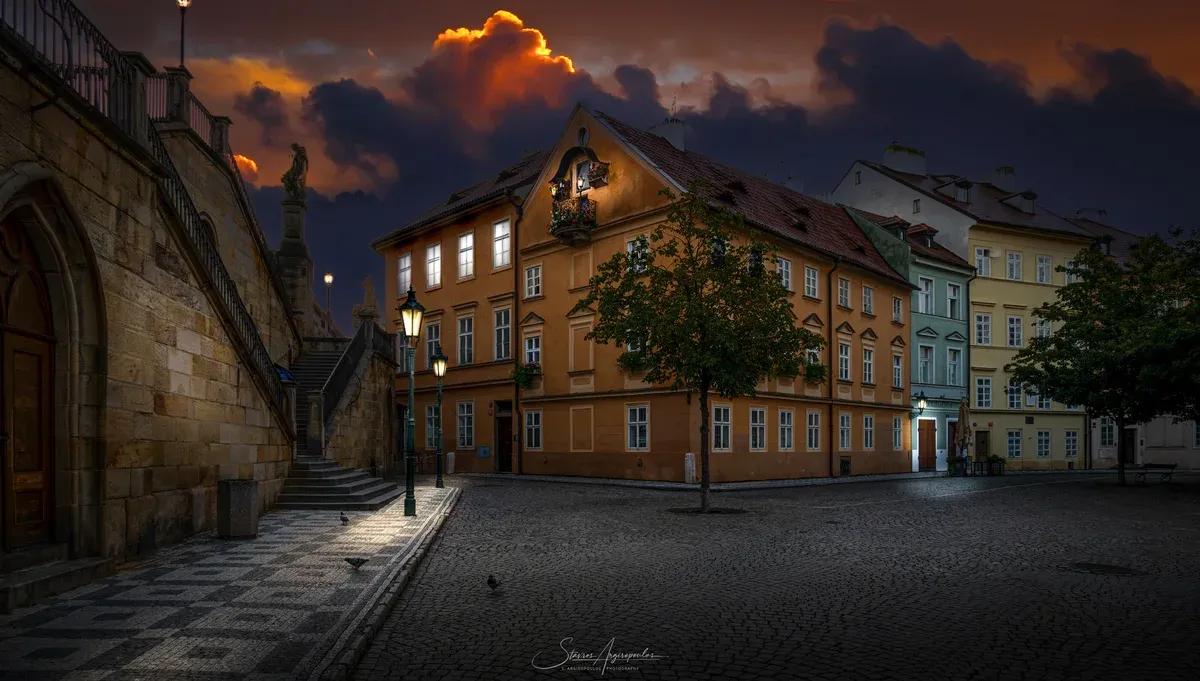 Houses on Kampa Island below the Charles Bridge steps at dusk